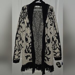 Solitaire Boho Black and Cream Oversized Cardigan Sweater With Fringe Hem Detail